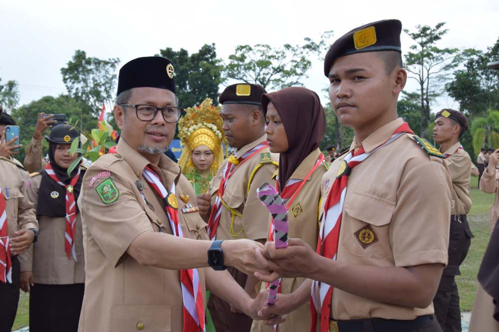 Gerakan Pramuka Ajarkan Tolong Menolong Sesama dan Ikut Serta Membangun Masyarakat – Warta Pramuka